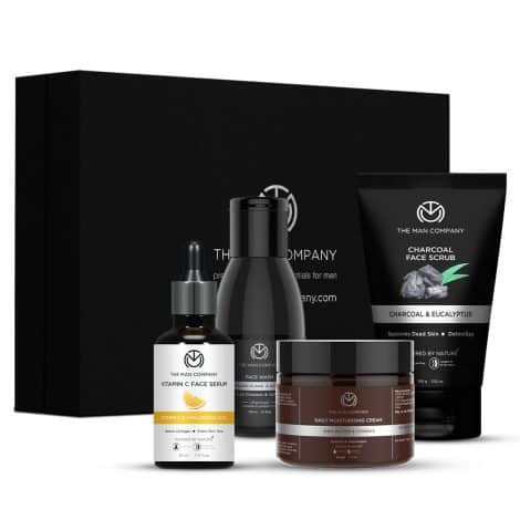 Gift set for men that includes a facial kit, Vitamin C Serum, charcoal face wash, face scrub, and moisturizing cream. Achieve soft and supple skin.