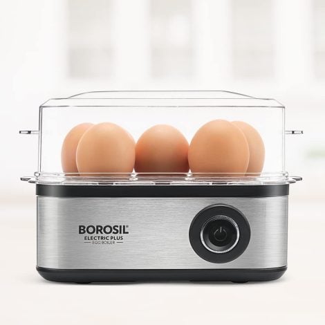 Borosil Electric Egg Boiler: Cook up to 8 eggs in different textures, steam veggies, with clear lid and steel body.