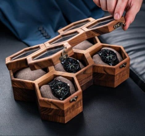 Premium wooden watch box for men with hinged lid, perfect for organizing and displaying your timepieces. Ideal for gifting on special occasions.