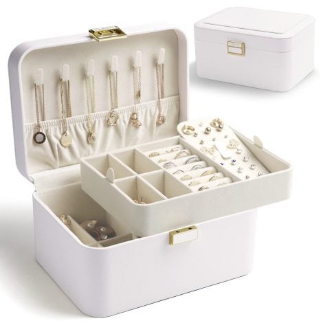 Luxurious white leather jewelry box with 2 layers to neatly organize earrings, bracelets, rings, and necklaces. Perfect gift.