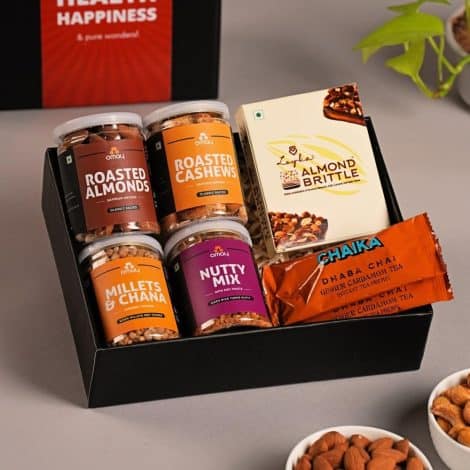 Omay Foods’ Healthy Treats Gift Box: A perfect gift for personal or corporate gifting, filled with oil-free snacks, tea, and more.