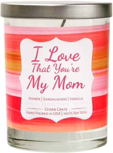 Exclusive Amber, Sandalwood, and Vanilla scented candles in a 10 oz. decorative jar. Perfect gifts for Mom or Wife.