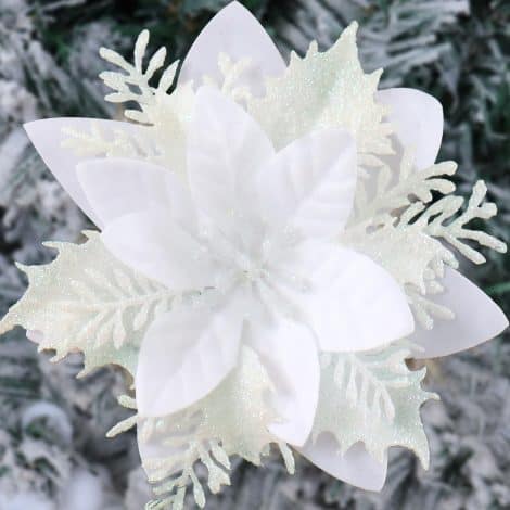 Get 16pcs of artificial Poinsettia flowers with clips and stems to decorate your white Christmas tree.