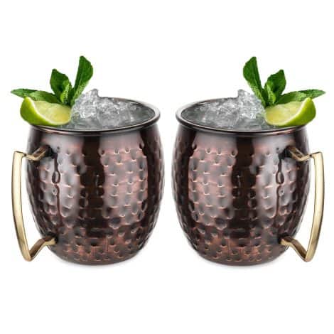 Steren Impex presents a festive gift set of 2 Moscow Mule beer mugs in antique copper-plated stainless steel.